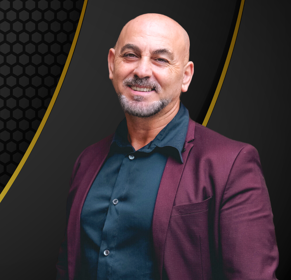 Joseph Mourad, inventor of the DCS all-in-one hair styling device, showcasing his patented innovation