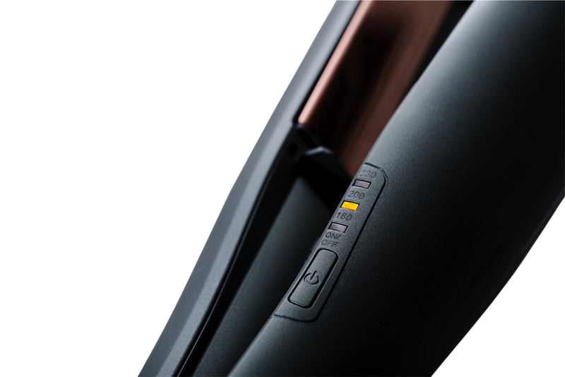 Close-up of the DCS hair styling device's precision temperature control settings, ensuring optimal styling with adjustable heat levels